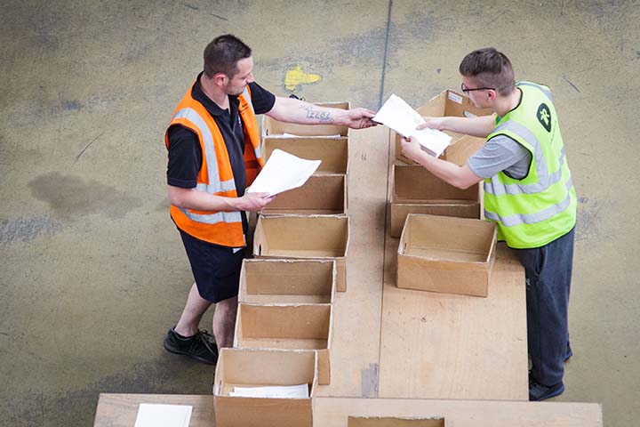 Workers pack boxed in Miami location