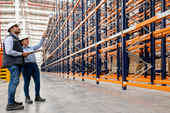 Workers installing warehouse racking system